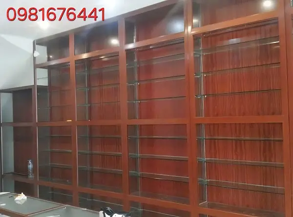Báo giá tủ nhôm kính, tủ bếp nhôm kính đẹp giá rẻ 2026 28 Tủ quầy thuốc nhôm kính - màu vân gỗ